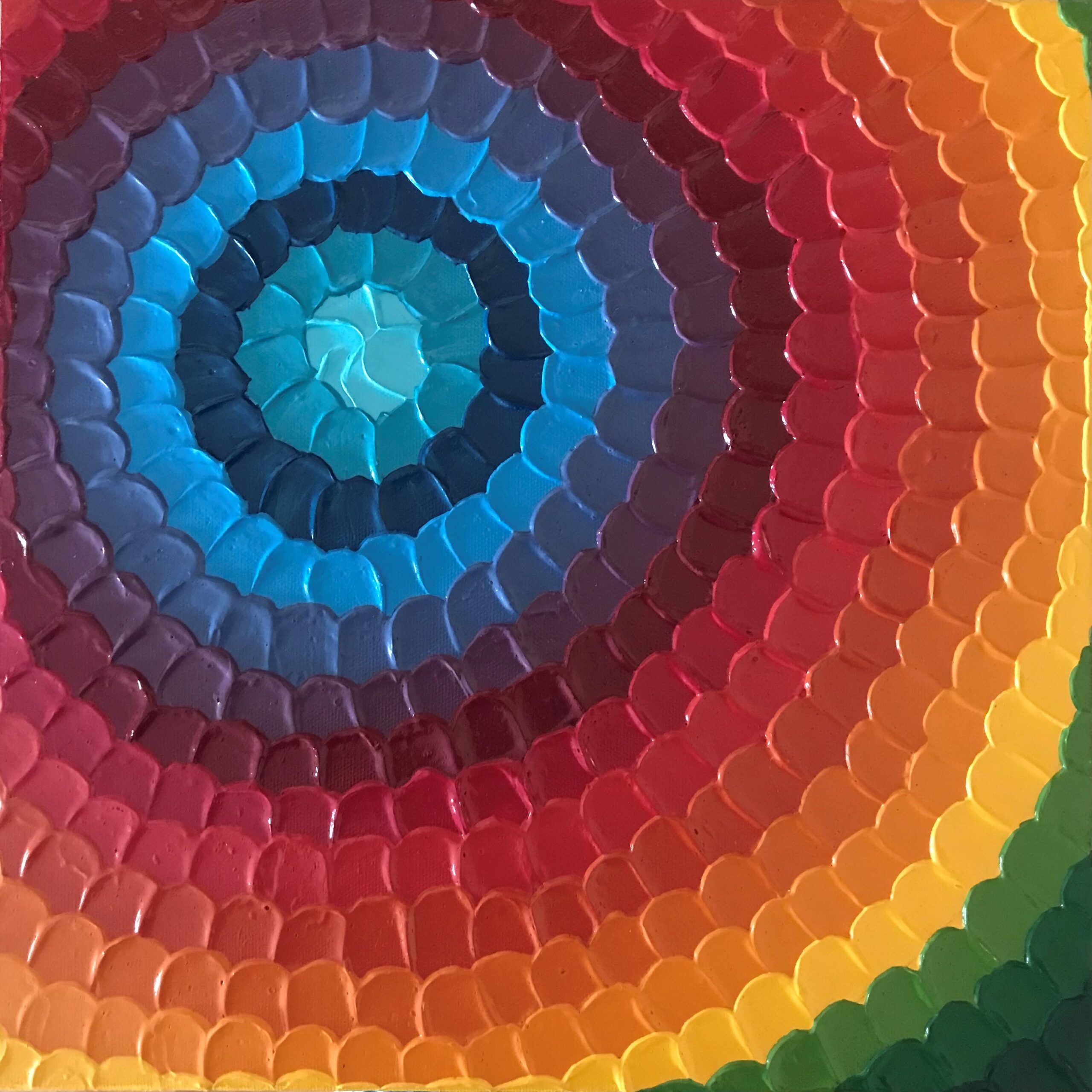 a painting that shows a rainbow concentric pattern