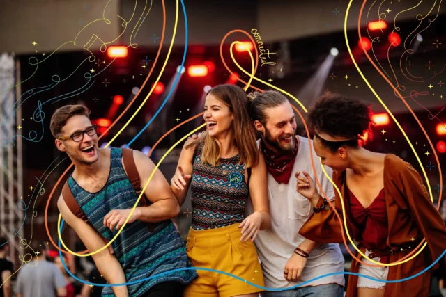 A group of people dancing at a festival. They feel happy and connected.