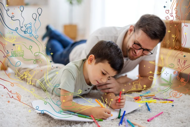 A happy man colouring in with a child